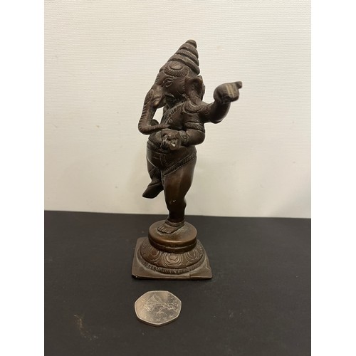 13 - Bronze figure, a standing figure of Genesh 16 cm high

This lot is available for in-house shipping