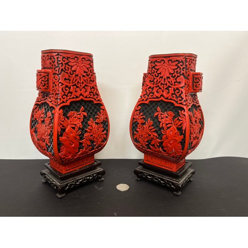 15 - Pair of Chinese red lacquer vases on stands.

This lot is available for in-house shipping