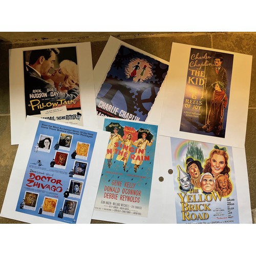 341 - Film posters, six quality prints of iconic movie posters, Singing in The Rain The Yellow Brick Road,... 