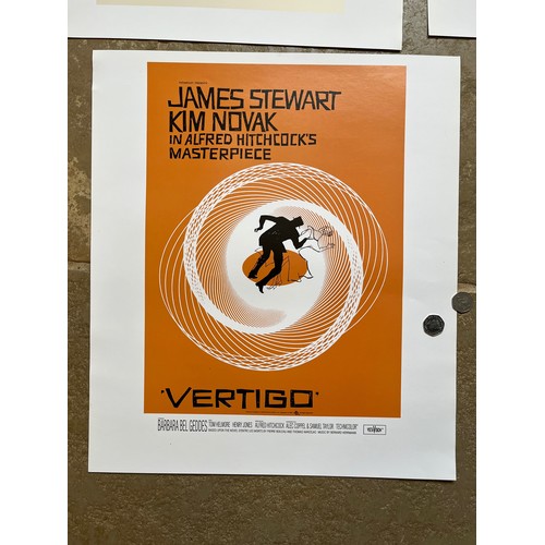 344 - Film posters, six quality prints of iconic movie posters, Breakfast at Tiffanys, Vertigo Clockwork O... 