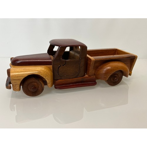 29 - Automobilia, a wooden model of a 1955 Chevrolet pick up truck. 9 ½ inches long.

This lot is availab... 