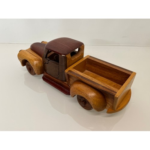 29 - Automobilia, a wooden model of a 1955 Chevrolet pick up truck. 9 ½ inches long.

This lot is availab... 