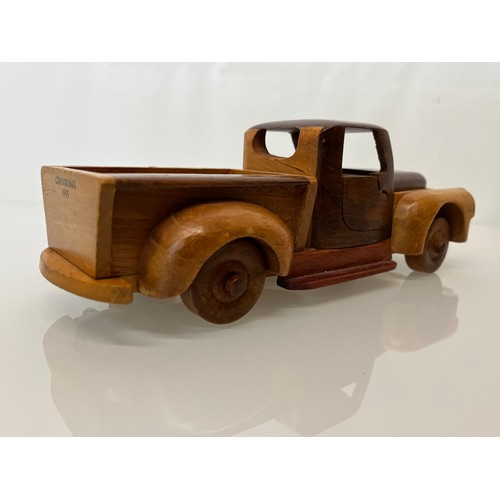 29 - Automobilia, a wooden model of a 1955 Chevrolet pick up truck. 9 ½ inches long.

This lot is availab... 