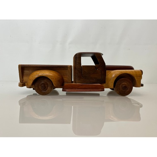 29 - Automobilia, a wooden model of a 1955 Chevrolet pick up truck. 9 ½ inches long.

This lot is availab... 