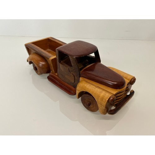 29 - Automobilia, a wooden model of a 1955 Chevrolet pick up truck. 9 ½ inches long.

This lot is availab... 