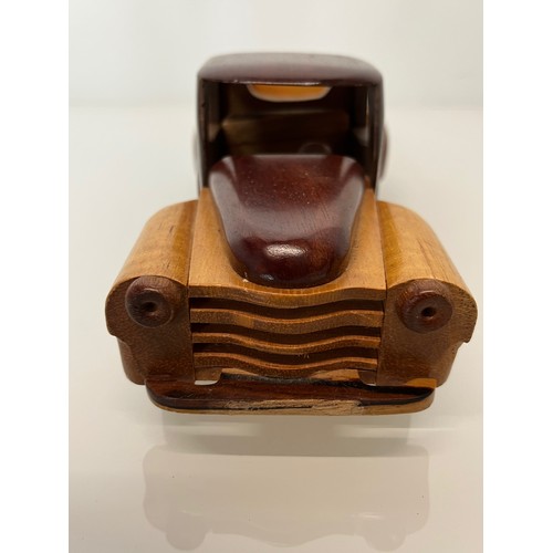 29 - Automobilia, a wooden model of a 1955 Chevrolet pick up truck. 9 ½ inches long.

This lot is availab... 