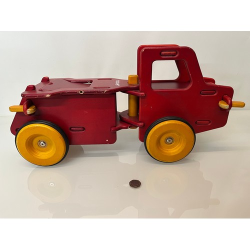 37 - Childs wooden ride on toy truck 23 inches long.

This lot is available for in-house shipping