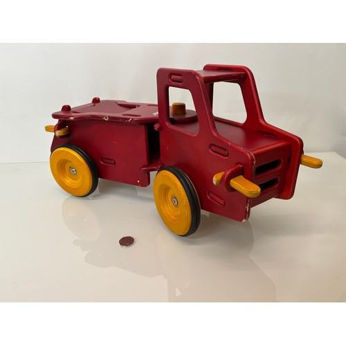 37 - Childs wooden ride on toy truck 23 inches long.

This lot is available for in-house shipping