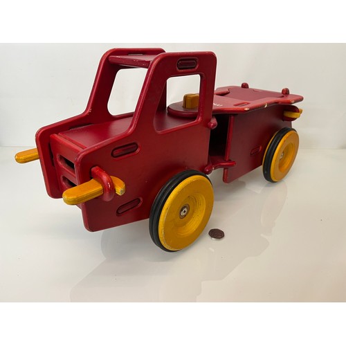 37 - Childs wooden ride on toy truck 23 inches long.

This lot is available for in-house shipping