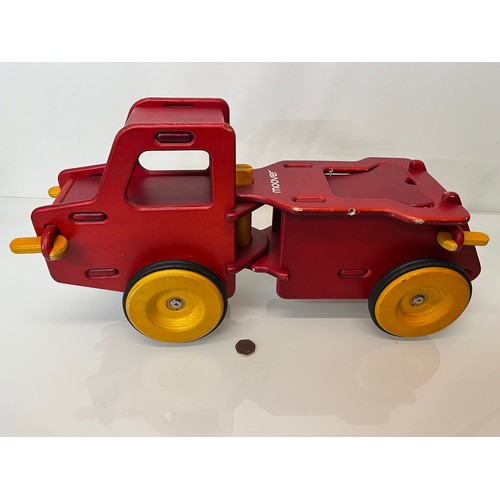 37 - Childs wooden ride on toy truck 23 inches long.

This lot is available for in-house shipping