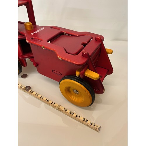 37 - Childs wooden ride on toy truck 23 inches long.

This lot is available for in-house shipping