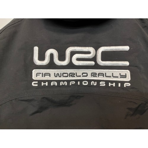 100 - Vintage motorsports clothing a World Motor Rally Championship branded jacket size M.

This lot is av... 