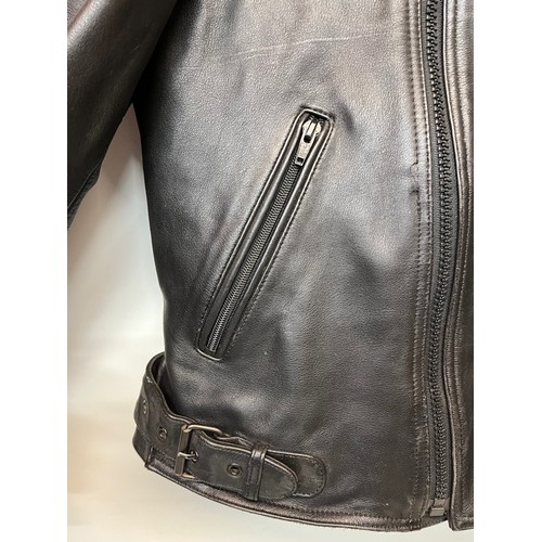 101 - Vintage clothing, a leather motorcycle jacket with quilted lining, size 56

This lot is available fo... 