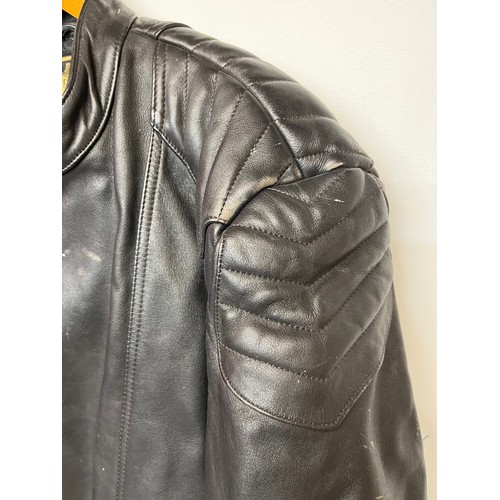 101 - Vintage clothing, a leather motorcycle jacket with quilted lining, size 56

This lot is available fo... 