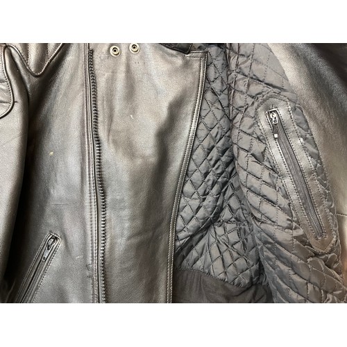 101 - Vintage clothing, a leather motorcycle jacket with quilted lining, size 56

This lot is available fo... 