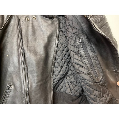 101 - Vintage clothing, a leather motorcycle jacket with quilted lining, size 56

This lot is available fo... 