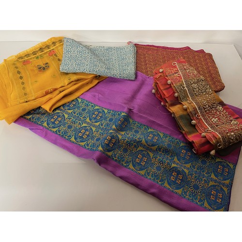 106 - Textiles, a collection of Indian fabrics.

This lot is available for in-house shipping