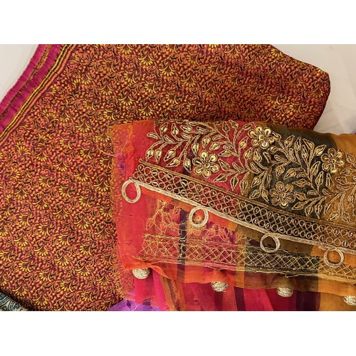 106 - Textiles, a collection of Indian fabrics.

This lot is available for in-house shipping