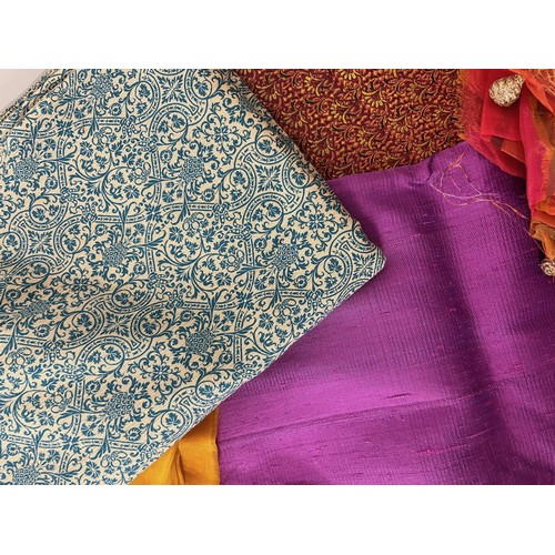 106 - Textiles, a collection of Indian fabrics.

This lot is available for in-house shipping