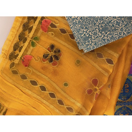 106 - Textiles, a collection of Indian fabrics.

This lot is available for in-house shipping