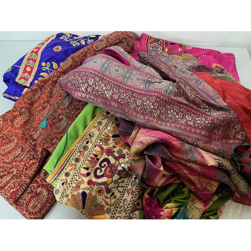 107 - Clothing, a collection of Indian skirts, coats etc.

This lot is available for in-house shipping