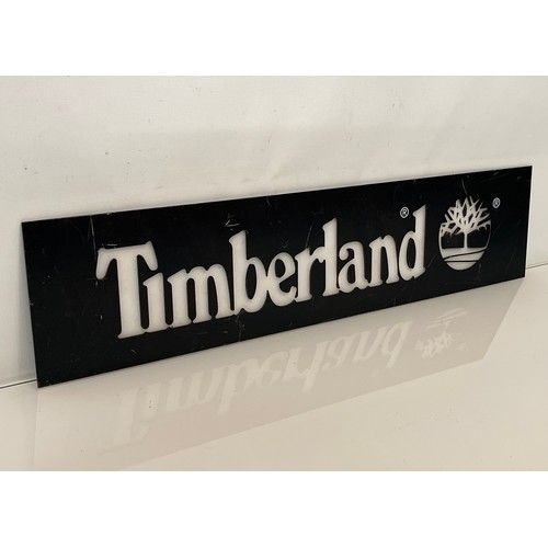 108 - Shop advertising sign, a Timberland point of sale sign with opaque lettering for back lighting. 22 i... 