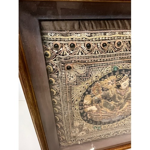 111 - Framed Indian embroidery cushion, 65cm x 48cm.

This lot is collection only.