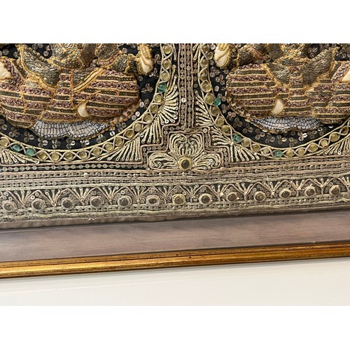 111 - Framed Indian embroidery cushion, 65cm x 48cm.

This lot is collection only.