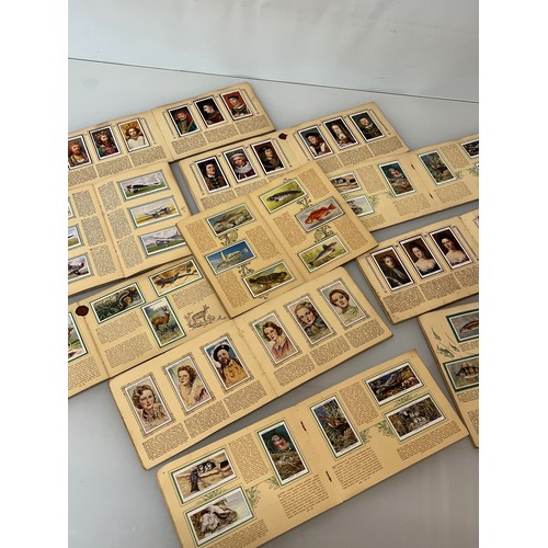 115 - Ephemera, John Player cigarette cards, a collection in ten albums as shown.

This lot is available f... 