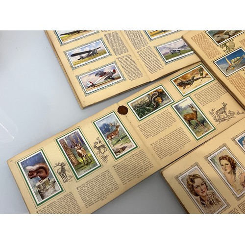 115 - Ephemera, John Player cigarette cards, a collection in ten albums as shown.

This lot is available f... 