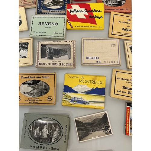 118 - Ephemera, tourist photographs, a collection in albums and packs etc as shown.

This lot is available... 