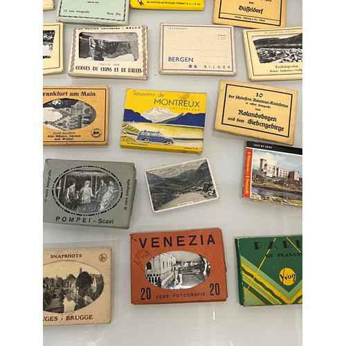 118 - Ephemera, tourist photographs, a collection in albums and packs etc as shown.

This lot is available... 