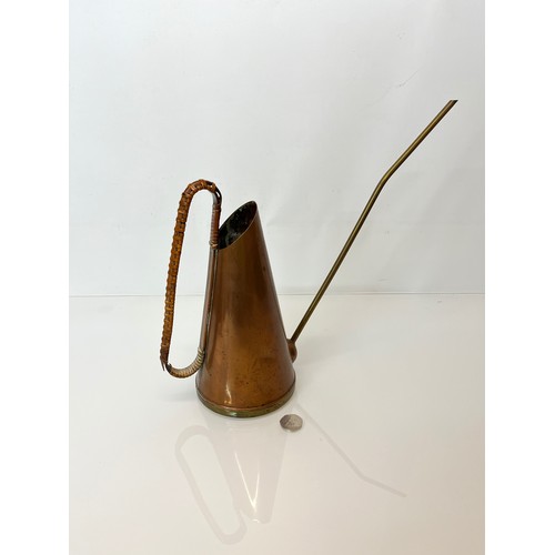 125 - Copper watering can.

This lot is available for in-house shipping