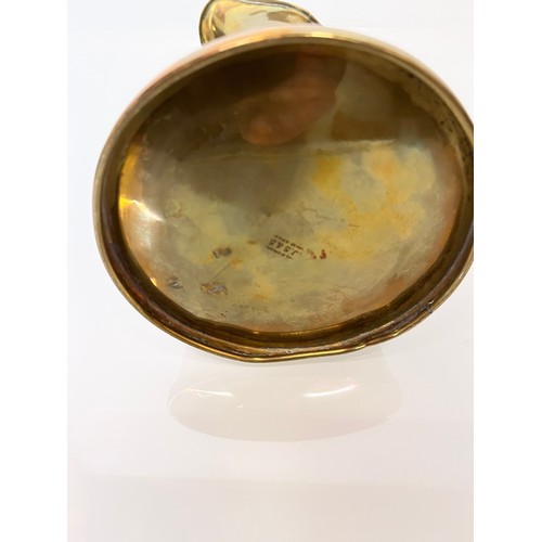 126 - Brass jug with embossed art nouveau decoration. 

This lot is available for in-house shipping