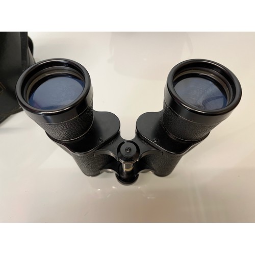 129 - Binoculars, two cased sets a 12 x 50 and a 16 x 50.

This lot is available for in-house shipping