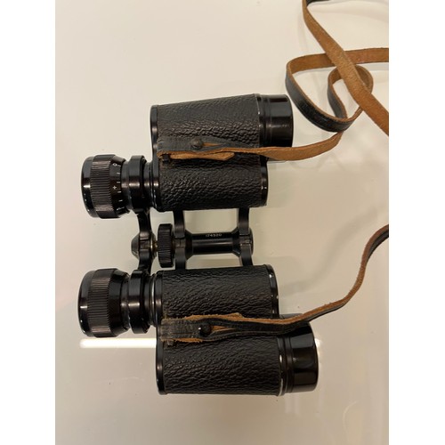 130 - Dolland 8 x 30 binoculars, in leather case.

This lot is available for in-house shipping