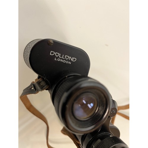 130 - Dolland 8 x 30 binoculars, in leather case.

This lot is available for in-house shipping