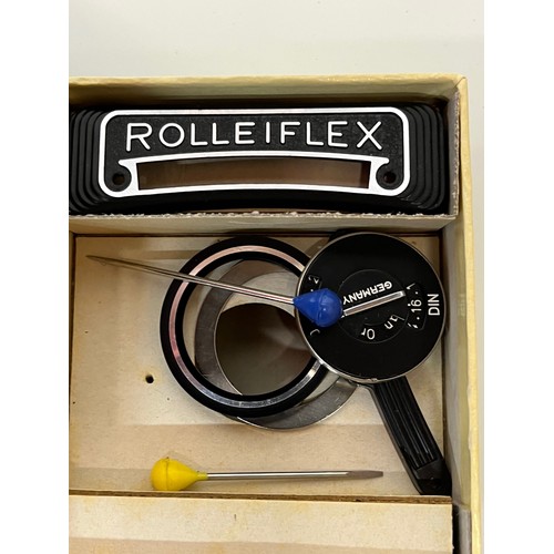 133 - Rolliflex camera parts and leather case section.

This lot is available for in-house shipping