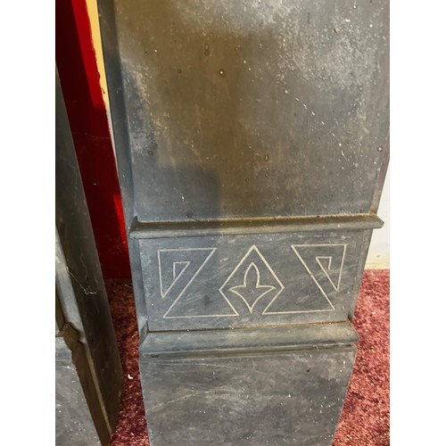 195 - Architectural salvage, a large slate mantle and fire surround with carved decoration 4 ft high and 4... 