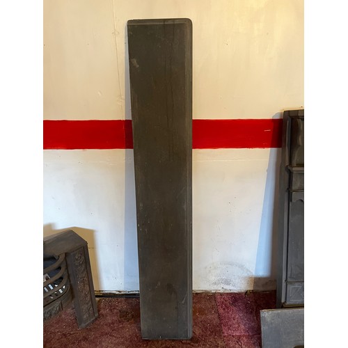 195 - Architectural salvage, a large slate mantle and fire surround with carved decoration 4 ft high and 4... 