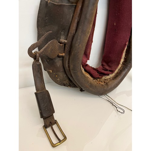 212 - Equestrian farming equipment, a horse collar with brass and wrought iron fittings.

This lot is avai... 