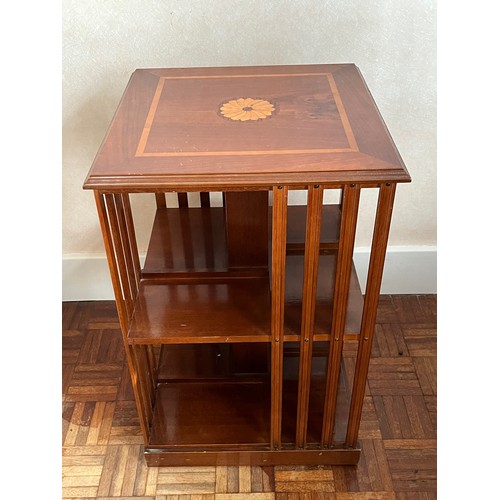 239 - Furniture, revolving book shelf with inlaid decoration.

This lot is available for in-house shipping