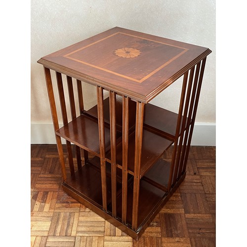 239 - Furniture, revolving book shelf with inlaid decoration.

This lot is available for in-house shipping