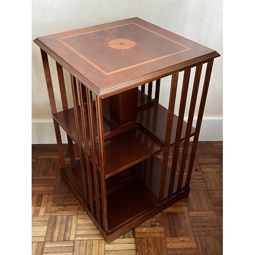 239 - Furniture, revolving book shelf with inlaid decoration.

This lot is available for in-house shipping