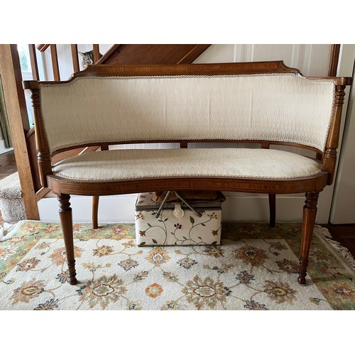 241 - Furniture, an upholstered kidney shaped Edwardian hall seat with inlaid decoration.

This lot is col... 