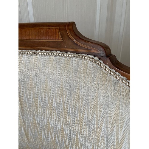 241 - Furniture, an upholstered kidney shaped Edwardian hall seat with inlaid decoration.

This lot is col... 