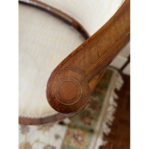 241 - Furniture, an upholstered kidney shaped Edwardian hall seat with inlaid decoration.

This lot is col... 