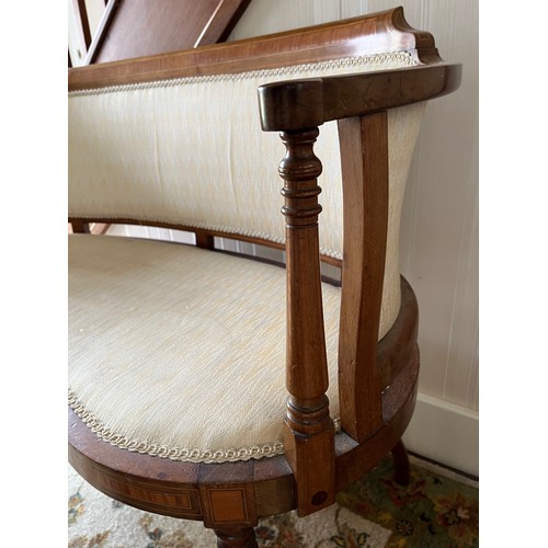 241 - Furniture, an upholstered kidney shaped Edwardian hall seat with inlaid decoration.

This lot is col... 