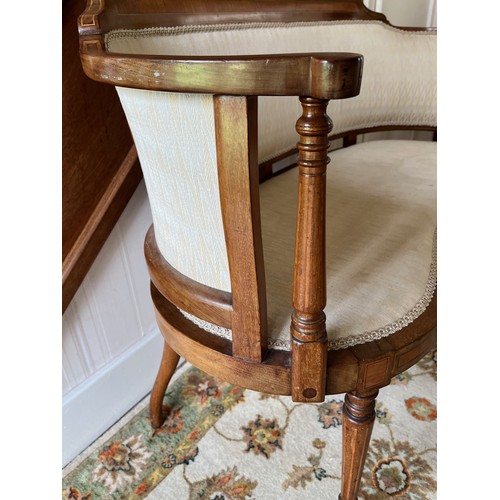 241 - Furniture, an upholstered kidney shaped Edwardian hall seat with inlaid decoration.

This lot is col... 