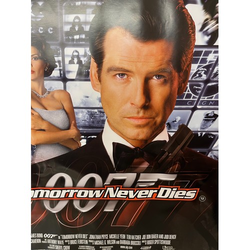 354 - Movie poster, 007 James Bond poster for the film Tomorrow Never Dies, 101 cm wide.

This lot is avai... 